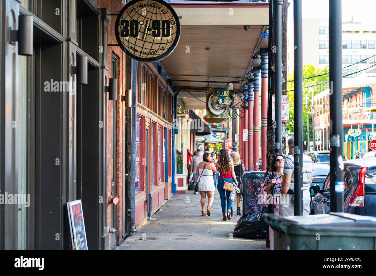 New Orleans, USA April 22, 2018 Frenchmen street sidewalk in French Quarter, Louisiana old
