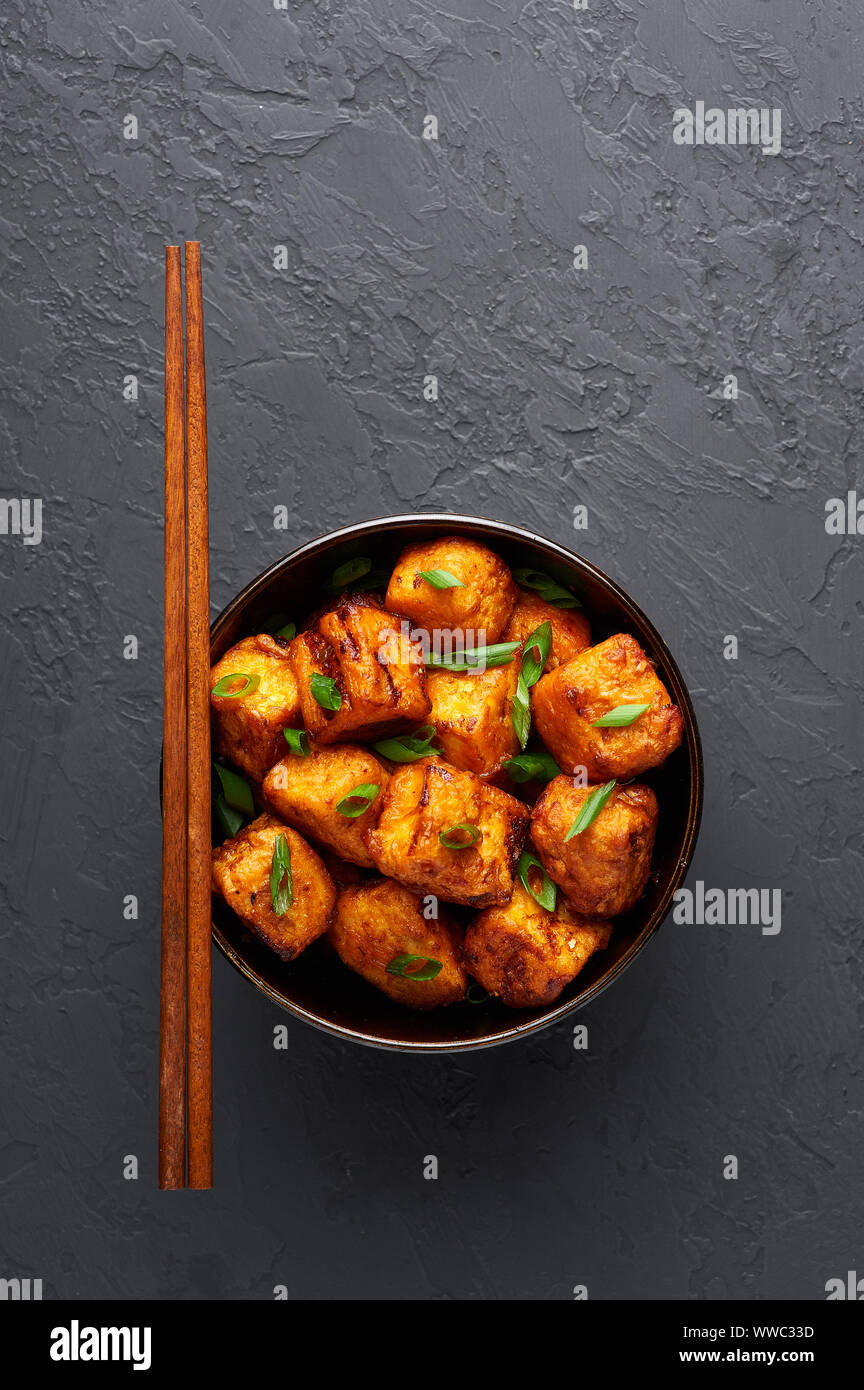 Paneer Manchurian or Paneer 65 in bowl at black concrete background