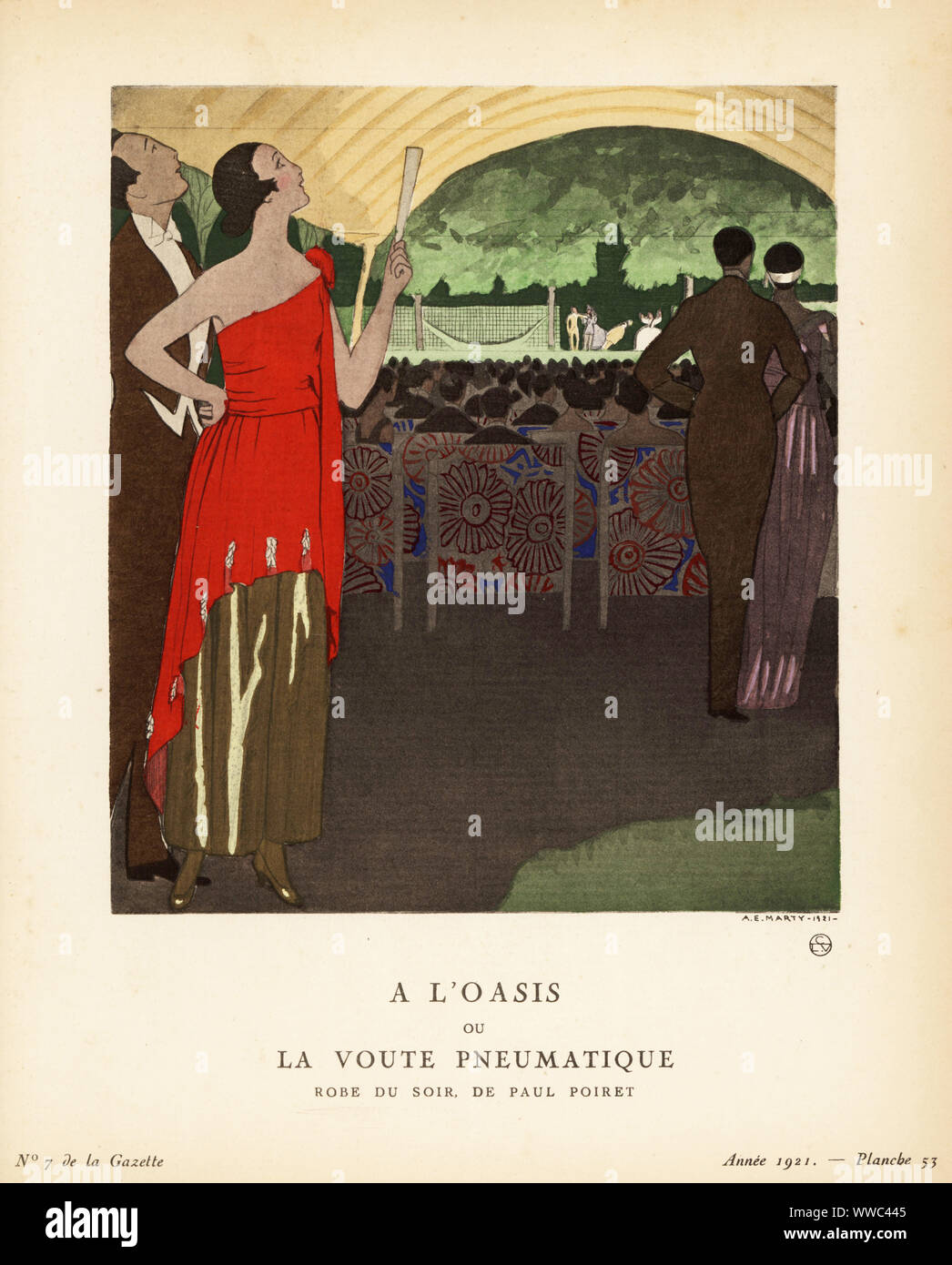 Woman in a red evening dress of crepe georgette watching a performance at L’Oasis, Paul Poiret’s private garden club. A l’oasis ou la voute pneumatique. Robe du soir de Paul Poiret. Cette robe du soir, de Paul Poiret, est composee d'une tunique en crêpe georgette rouge brodee d’epis d'or, tombant sur un fourreau de fluide d'or. Handcoloured pochoir lithograph by Andre Marty from Lucien Vogel’s Le Bon Genre: 100 Plates from Gazette du Bon Ton, Brentano’s, Paris, 1922. Stock Photo