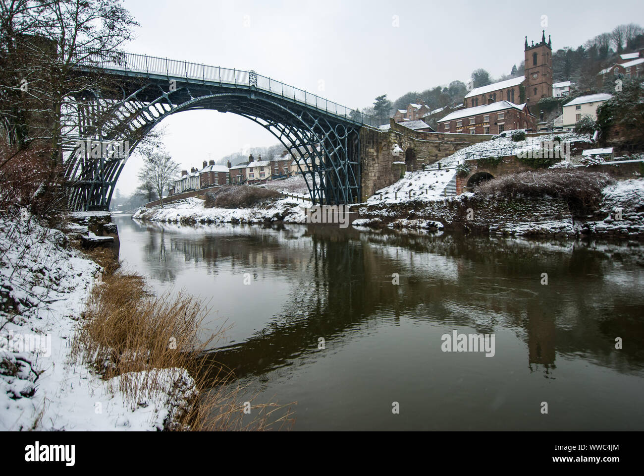 View of Ironbridge town from the side of the river Severn in Winter ...