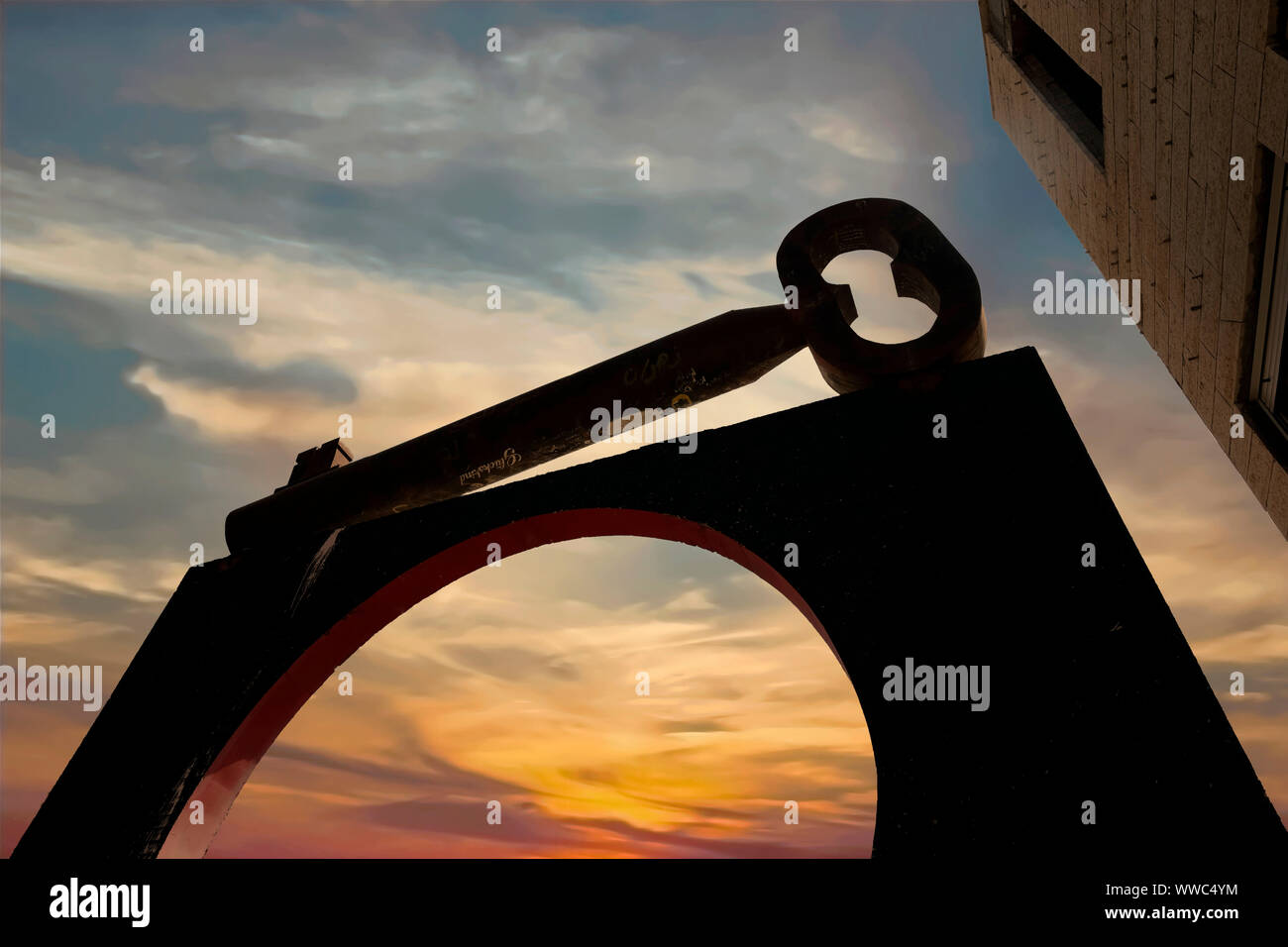 A huge, iron "key of return" rests over the entrance gate to Aida