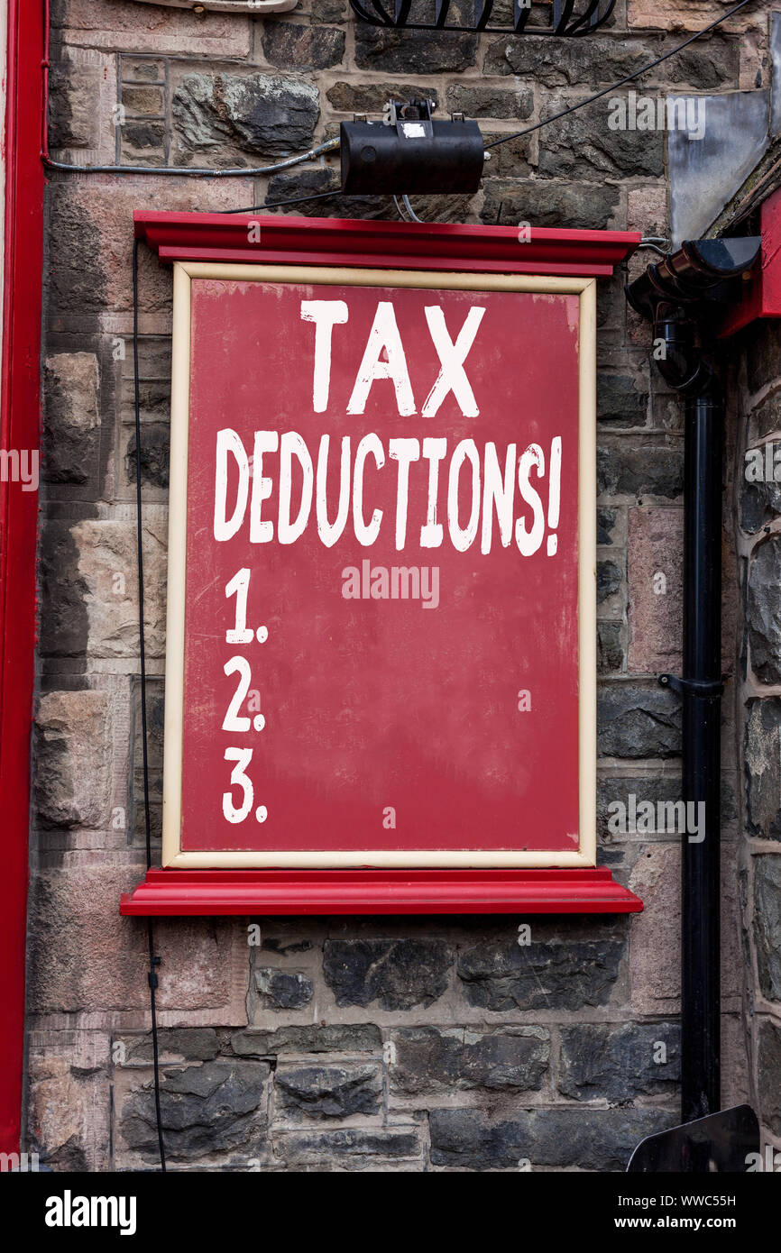 Conceptual hand writing showing Tax Deductions. Concept meaning ...