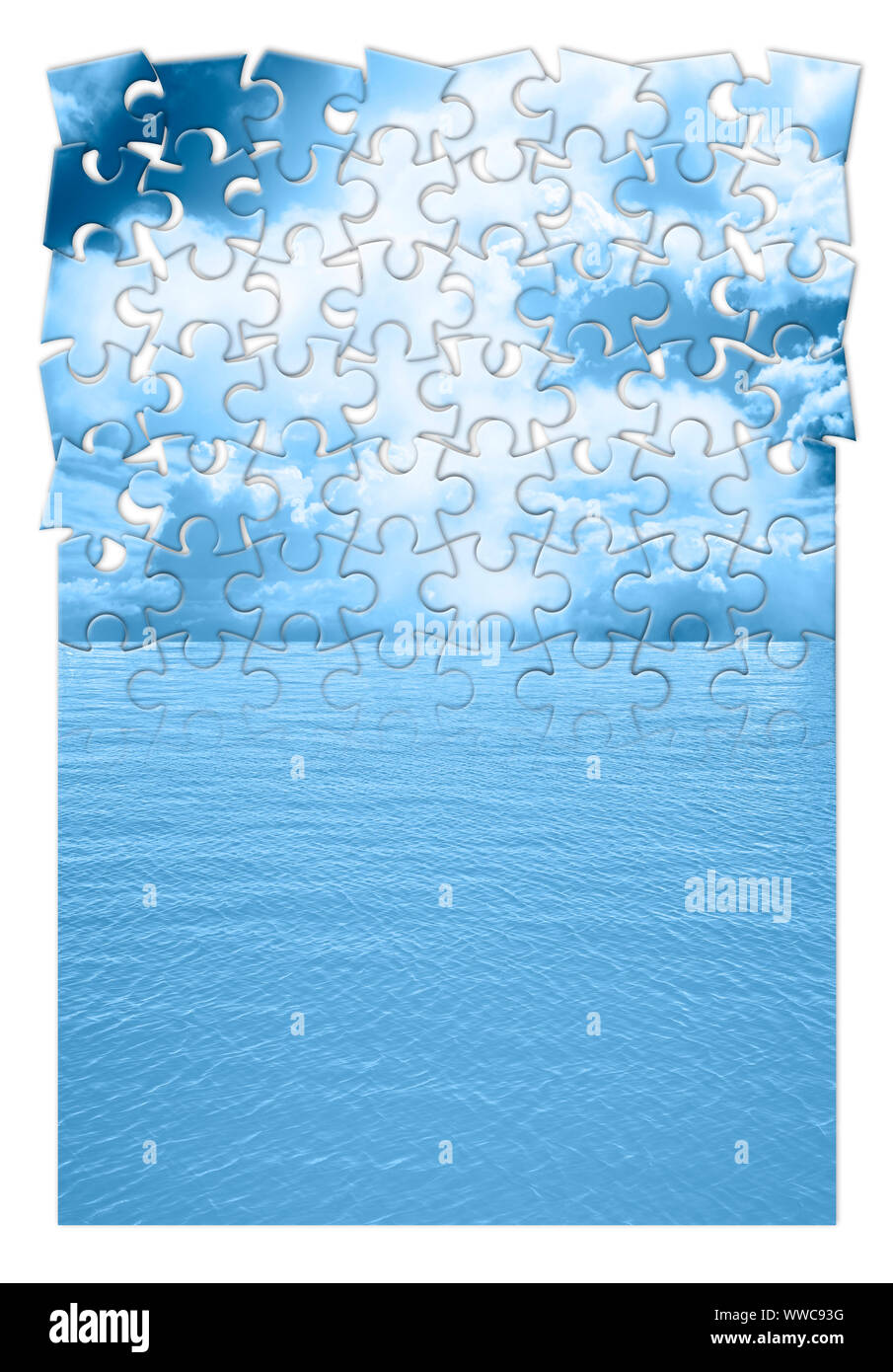 Calm sea with cloudy sky - concept image in jigsaw puzzle shape Stock Photo