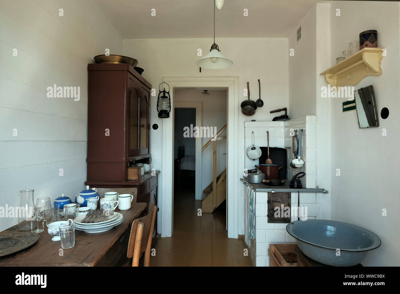 'Muzeum Wsi Lubelskiej' Open Air Village Museum in Lublin, Poland, 09/04/2019 interior of old typical eastern european kitchen in a provincial town in Stock Photo