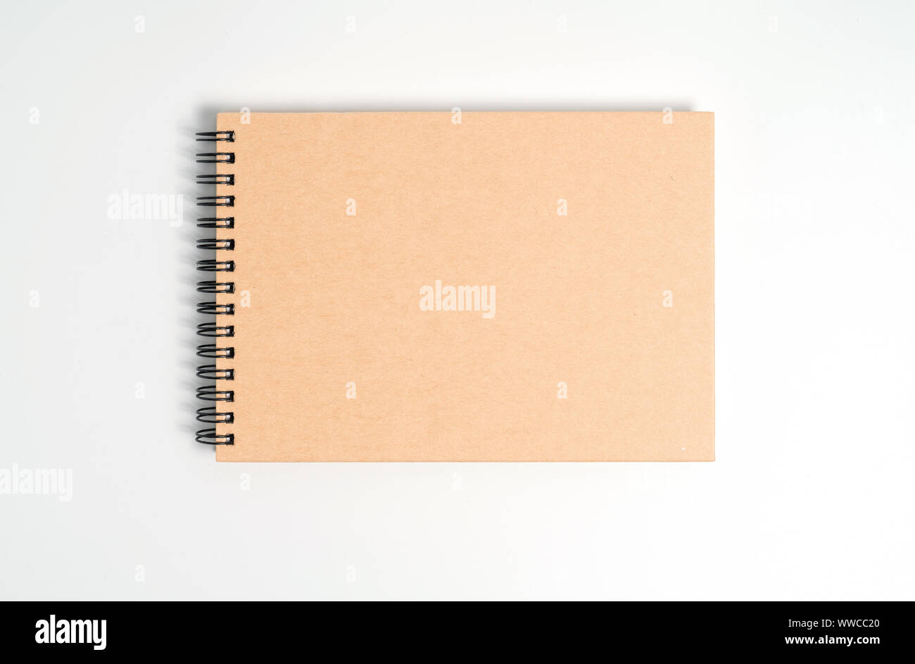 A notebook on a spring. Isolated on white background. Stock Photo