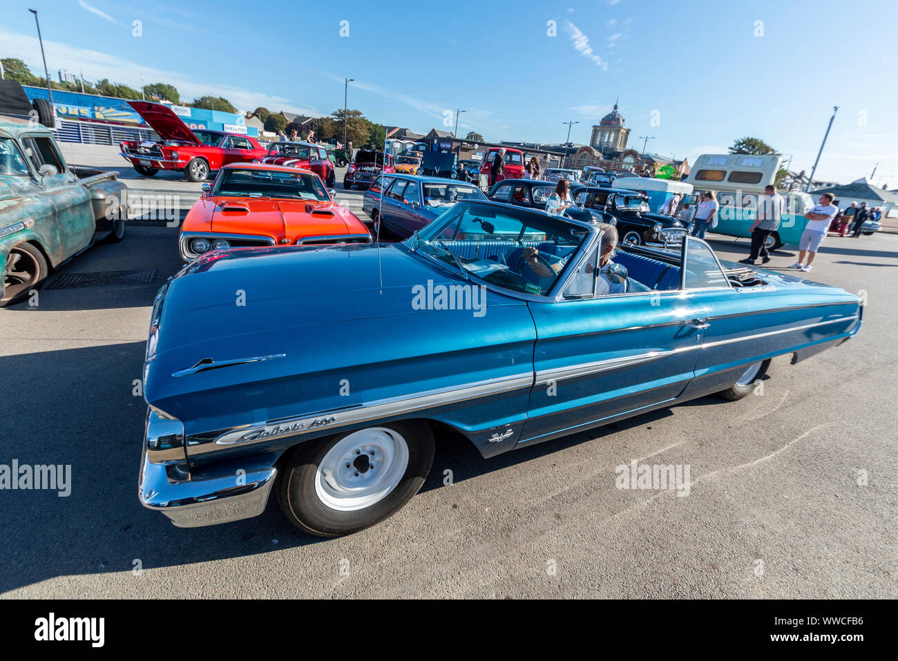 Classic and vintage cars have headed along the seafront of the seaside town to take part in a 'show 'n' shine' event at City Beach on Marine Parade in Southend on Sea, Essex. The UK weather has dawned bright, warm and sunny. Ford Galaxie 500 Stock Photo