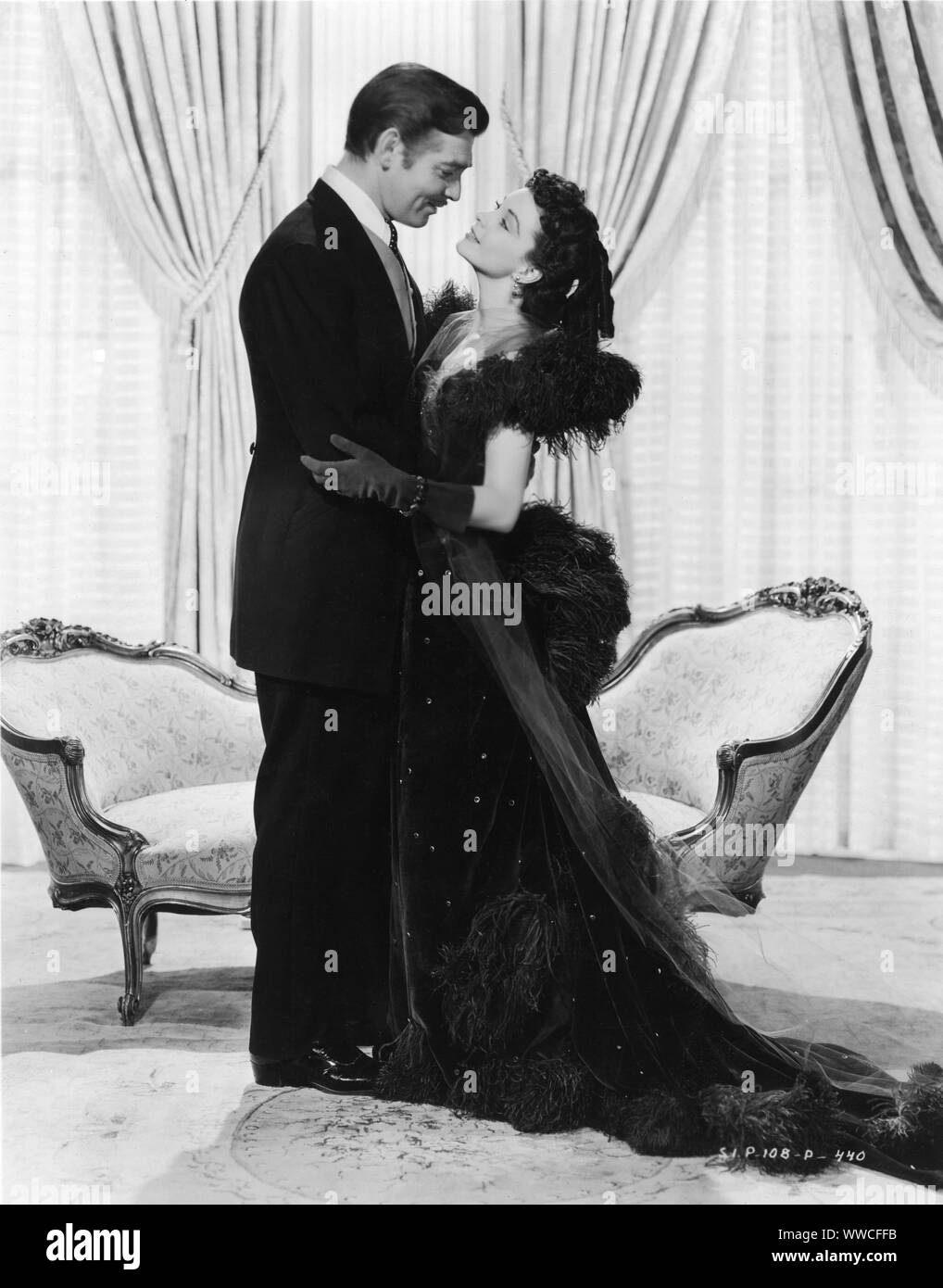 CLARK GABLE as Rhett Butler and VIVIEN LEIGH as Scarlett O'Hara in GONE WITH THE WIND 1939 director Victor Fleming novel Margaret Mitchell producer David O. Selznick Selznick International Pictures / Metro Goldwyn Mayer Stock Photo