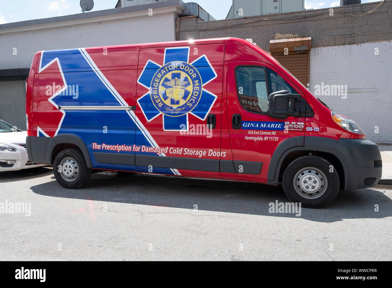 UNUSUAL BUSINESS. A van for Refrigerator Door medics, a portable business. Parked in Corona, Queens, New York City. Stock Photo