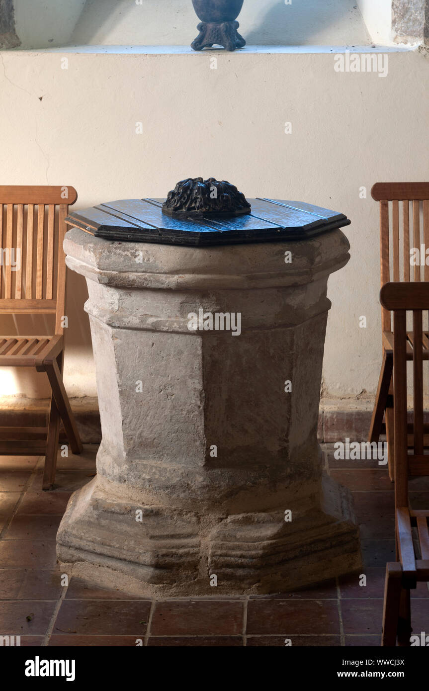 The font in St. Nicholas Church, Shangton, Leicestershire, England, UK