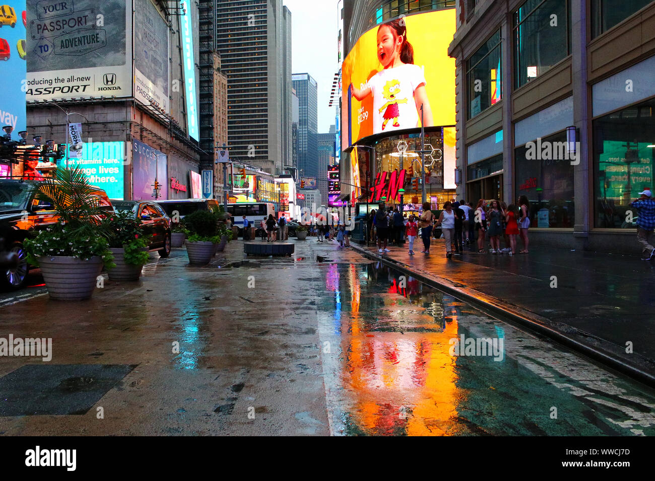 Times Square Congested Traffic of pedestrians, cyclists, and cars trudges through Times Square ...