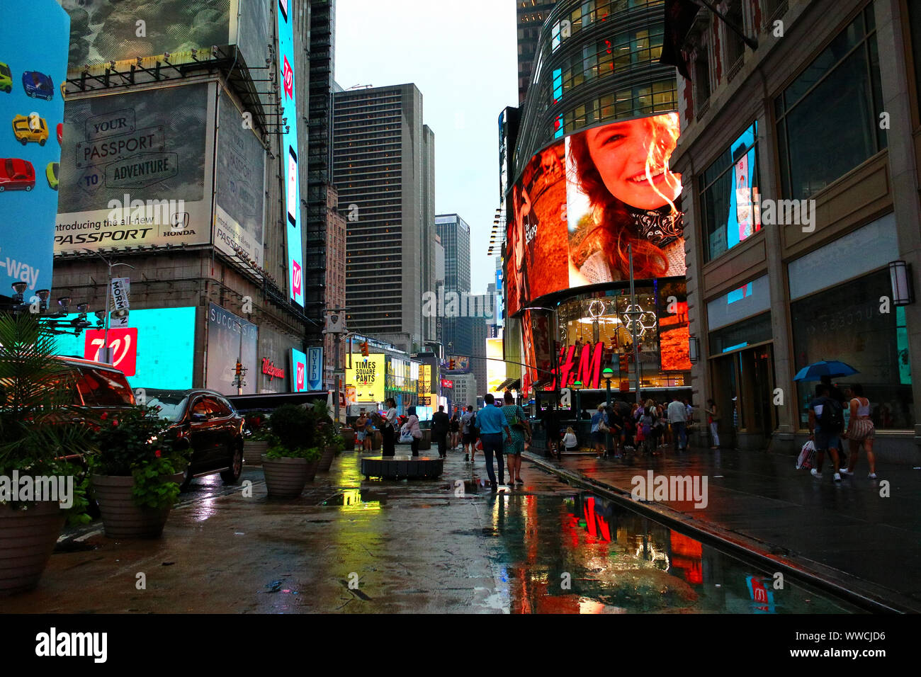 Times Square Congested Traffic of pedestrians, cyclists, and cars trudges through Times Square ...