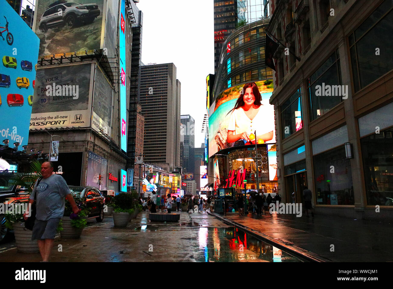 Times Square Congested Traffic of pedestrians, cyclists, and cars trudges through Times Square ...
