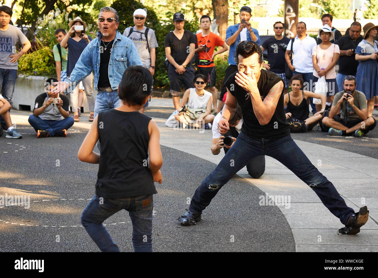 A Man And Boy Members Of The Strangers A Tokyo Rockabilly Club Dance At Yoyogi Park In Shibuya Tokyo Japan On A Sunny Summer Sunday Afternoon Stock Photo Alamy