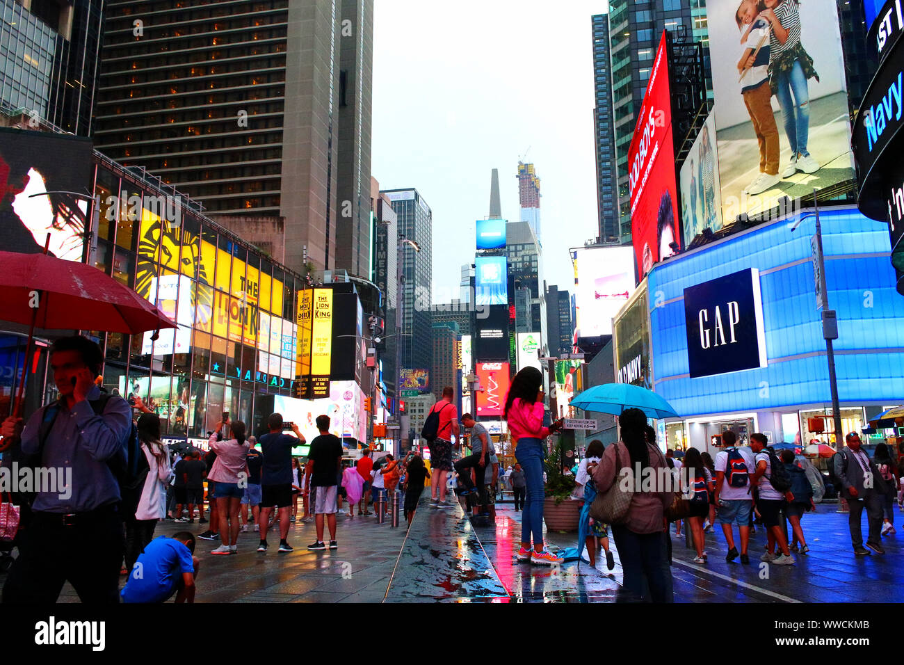 Times Square Congested Traffic of pedestrians, cyclists, and cars trudges through Times Square ...