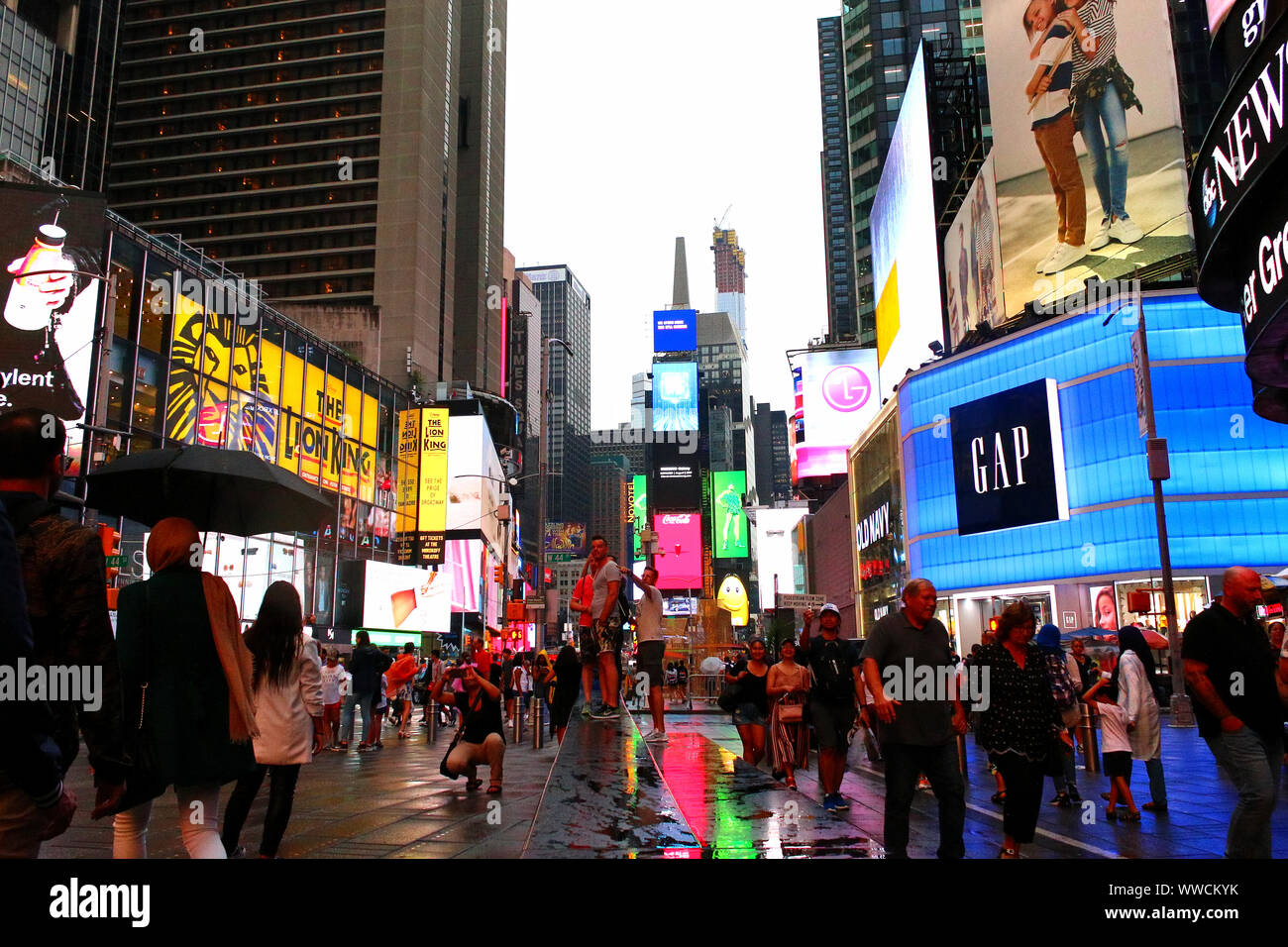 Times Square Congested Traffic of pedestrians, cyclists, and cars trudges through Times Square ...