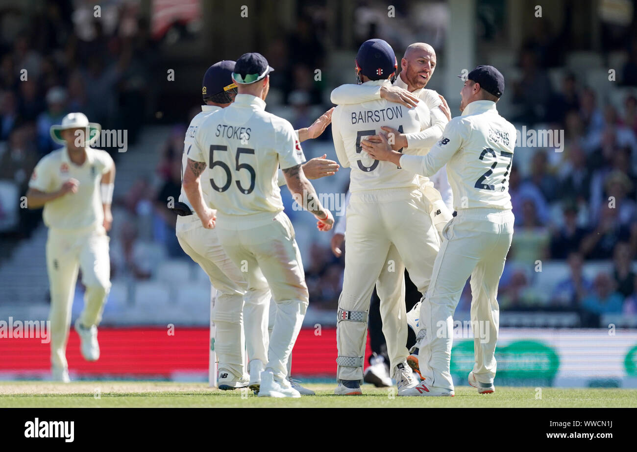 England's Jack Leach (second right) celebrates after Jonny Bairstow stumps out Australia's Marnus Labuschagne during day four of the fifth test match at The Kia Oval, London. Stock Photo