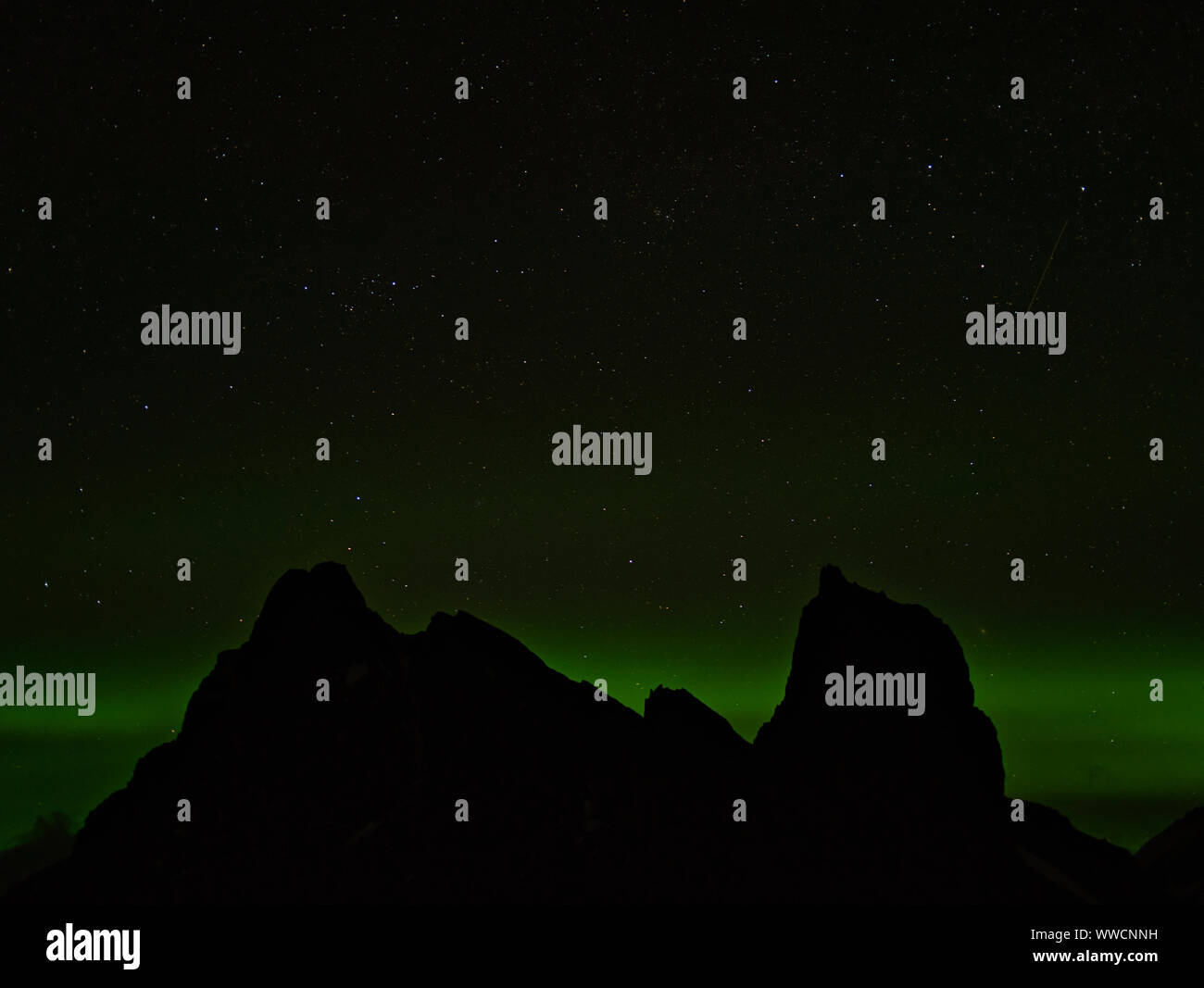 Aurora Borealis in Iceland behind the mountain peaks in March Stock ...
