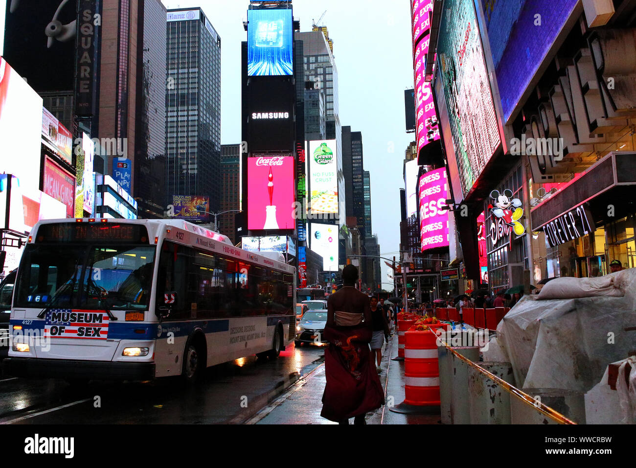 Times Square Congested Traffic of pedestrians, cyclists, and cars trudges through Times Square ...