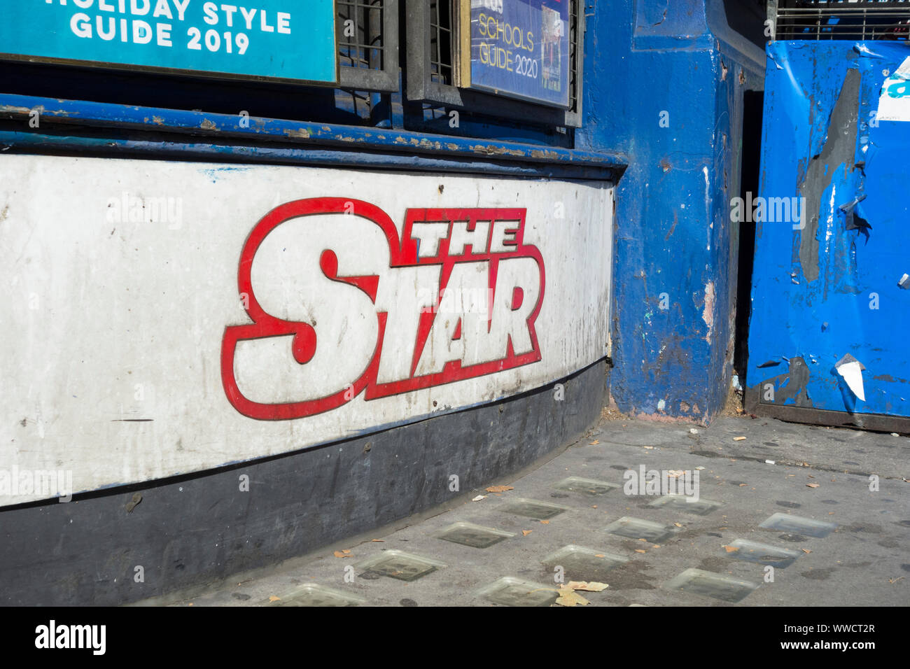 An advertisement on the exterior of a newsagent for the Star tabloid newspaper Stock Photo