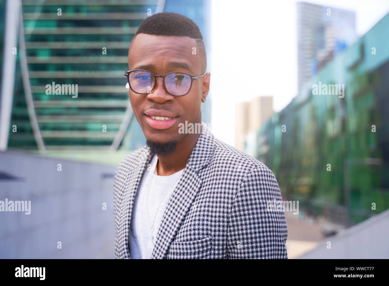 Stylish African guy smiling friendly at camera. Stock Photo
