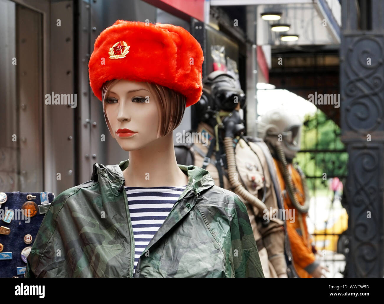 Female mannequin in a souvenir red Russian military cap. Stock Photo