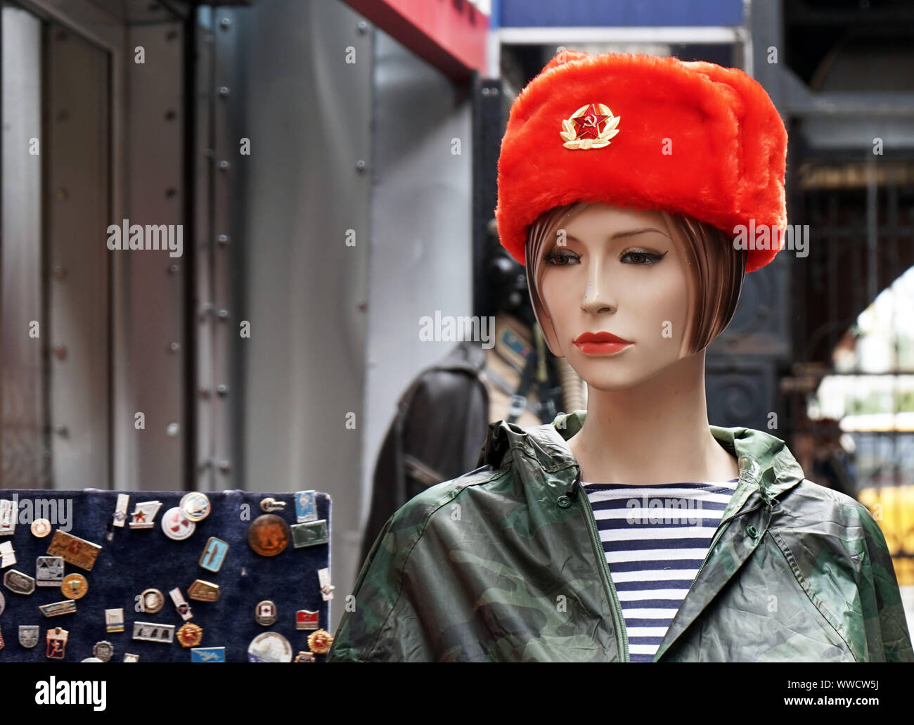 Female mannequin in a souvenir red Russian military cap. Stock Photo