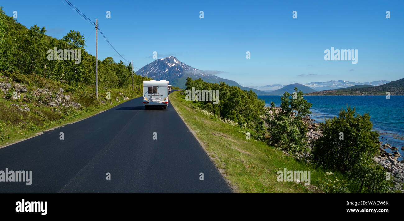 VR Caravan car travels on the highway. Tourism vacation and traveling. Beautiful Nature Norway natural landscape. Stock Photo