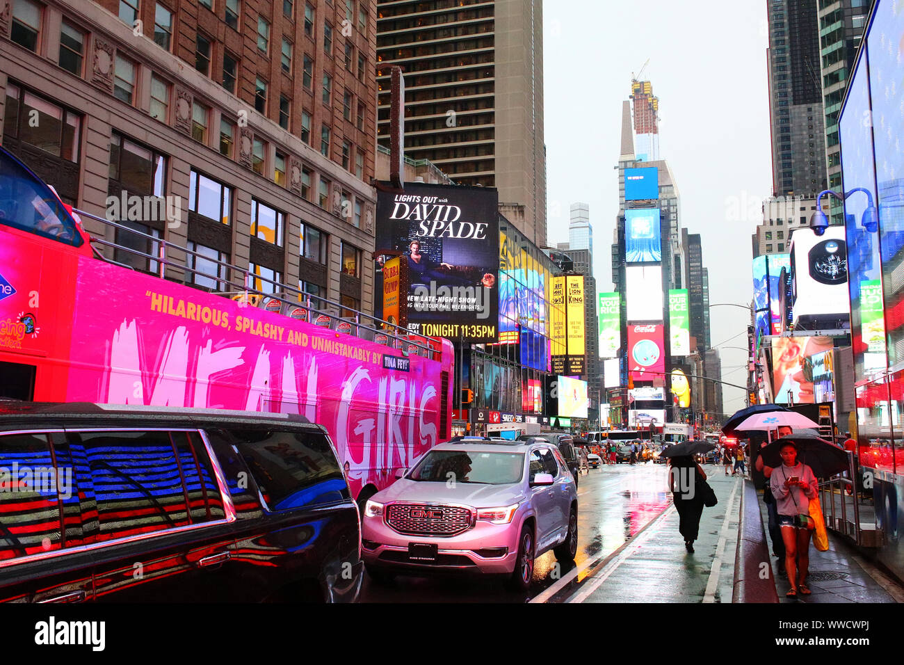 Times Square Congested Traffic of pedestrians, cyclists, and cars trudges through Times Square ...