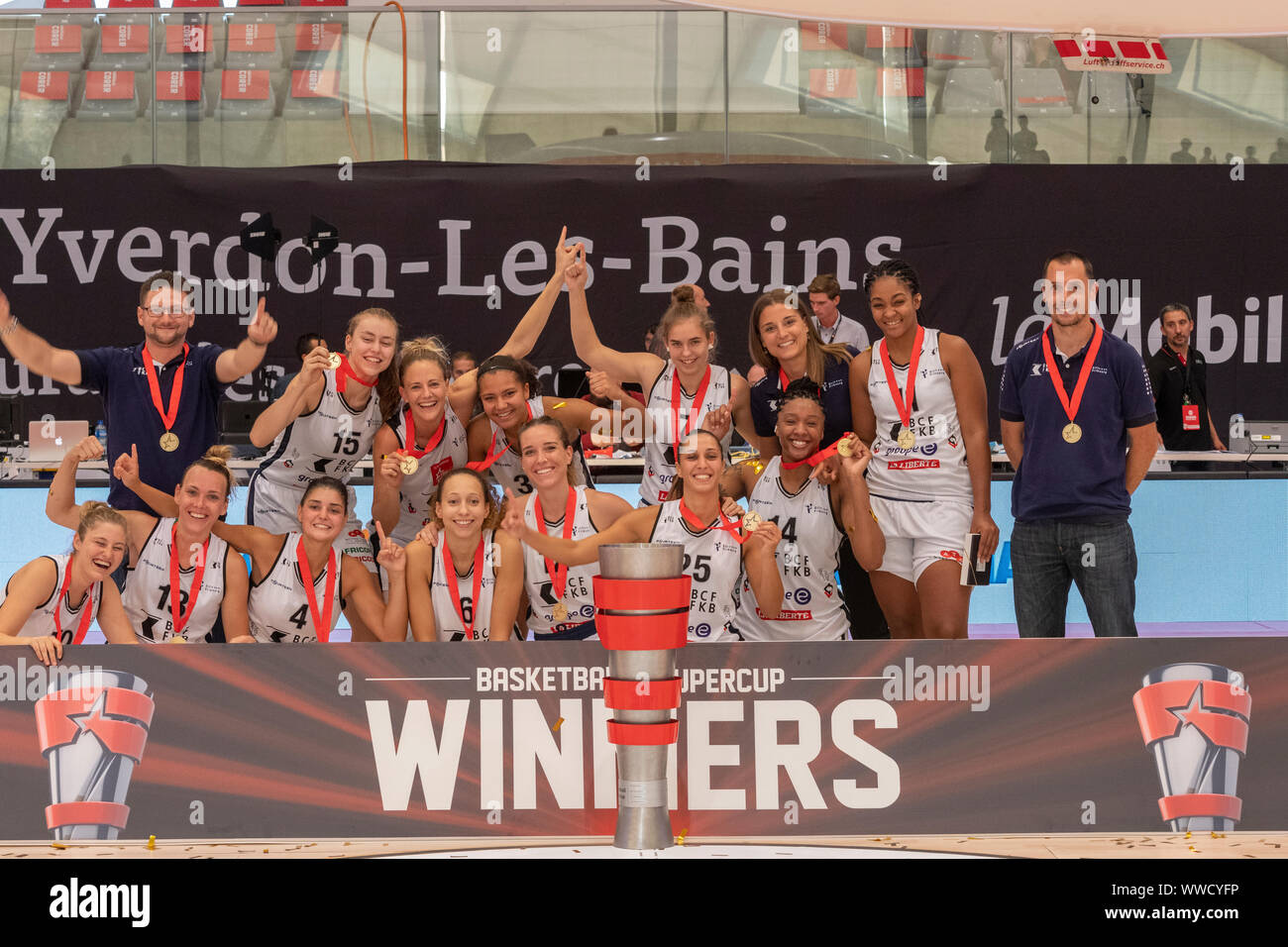 Yverdon Les Bains, Switzerland. 14th Sep, 2019. BCF ELFIC Fribourg Women's Basketball Team Savoring Their Victory During the Awards Ceremony at the Super Cup 2019 at the Yverdon-les-Bains Sports Center (Switzerland) (Photo by Eric Dubost/Pacific Press) Credit: Pacific Press Agency/Alamy Live News Stock Photo