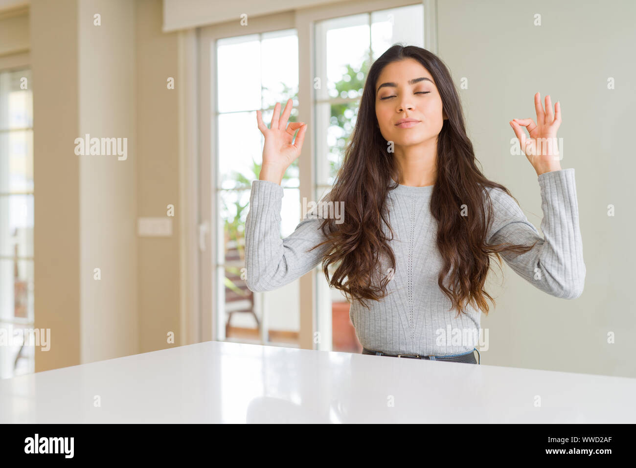 Young Beautiful Woman At Home Relax And Smiling With Eyes Closed