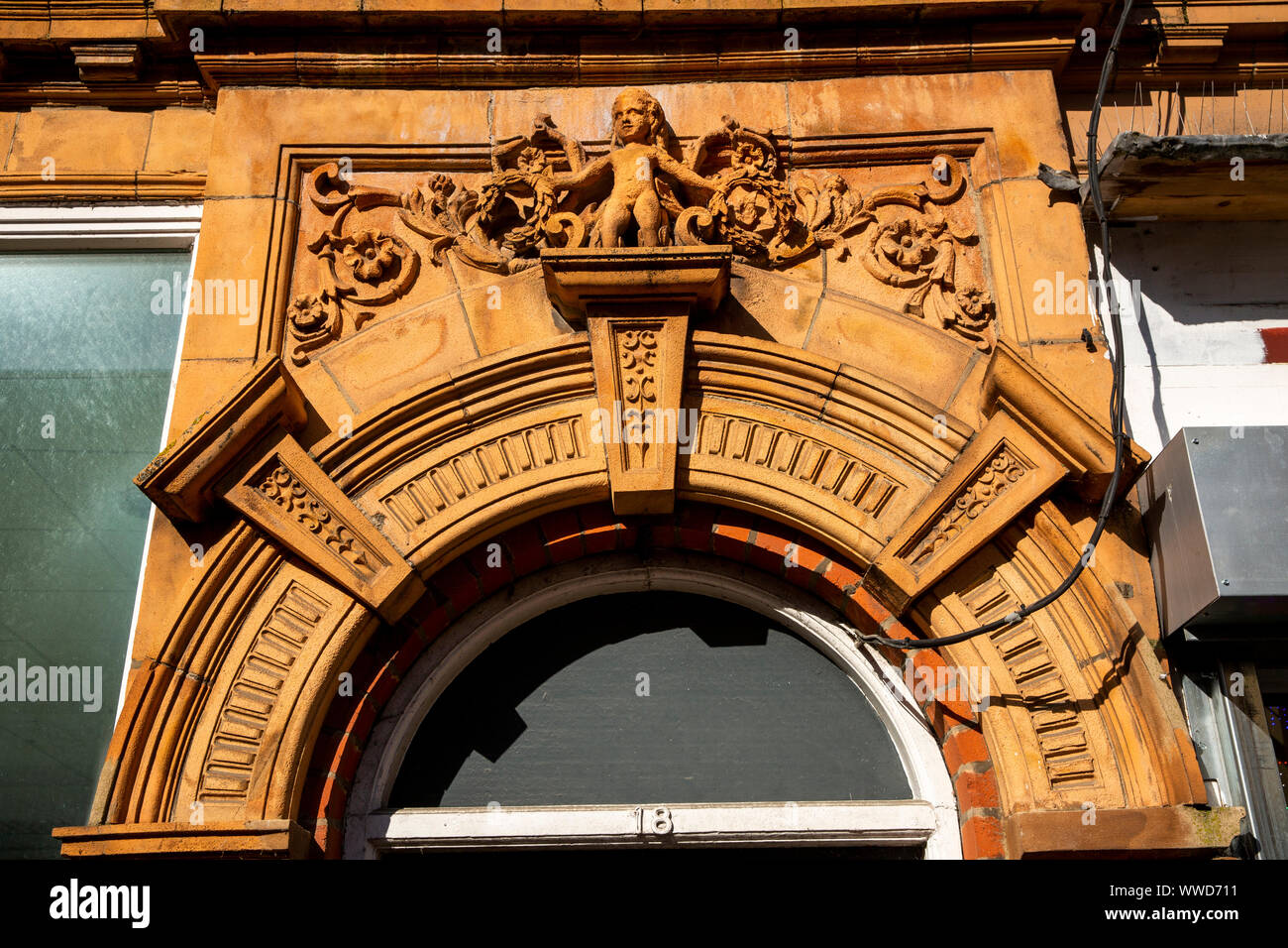 UK, County Durham, Bishop Auckland, 18 Newgate St, moulded detail above Grade 2 listed doorway Stock Photo