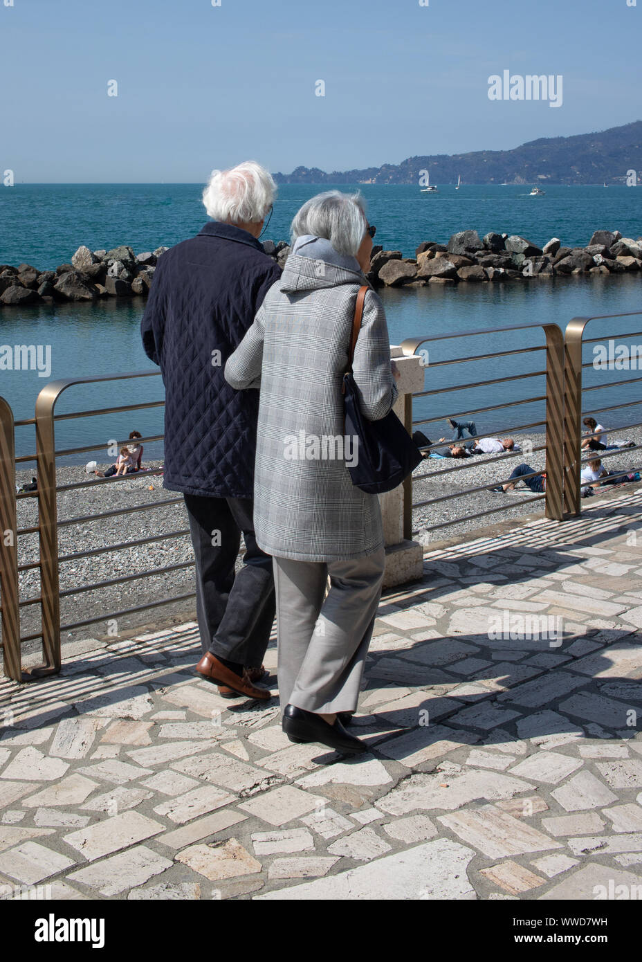 Old man woman walking arm hi-res stock photography and images - Alamy
