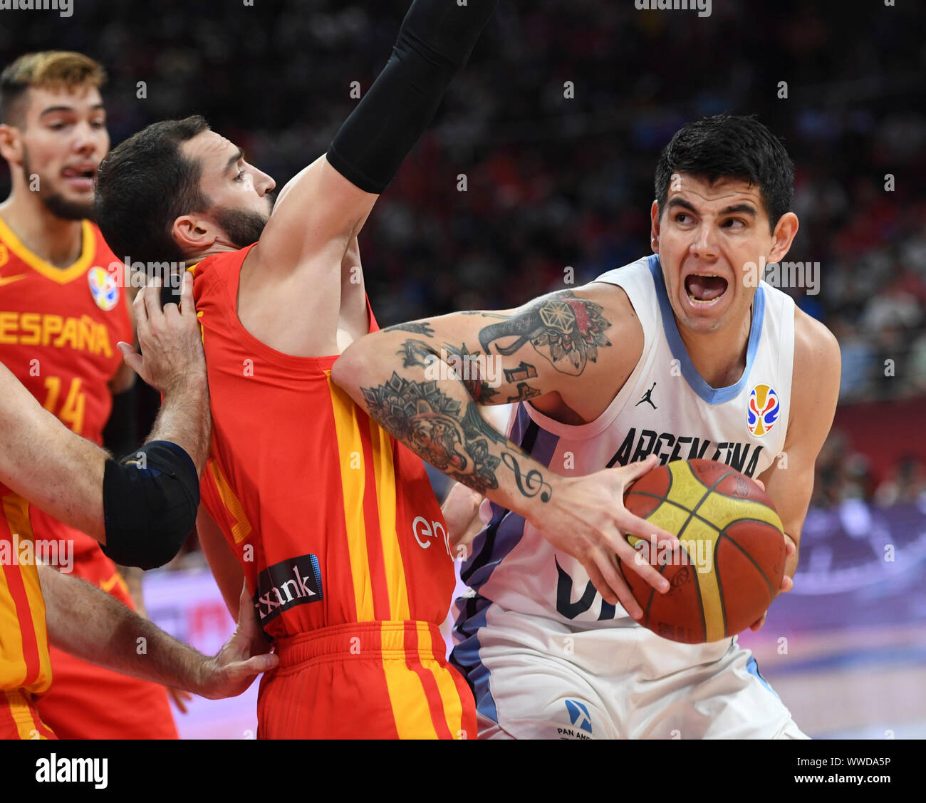 Beijing, China. 15th Sep, 2019. Gabriel Deck (R) of Argentina breaks through during the final match between Spain and Argentina at the 2019 FIBA World Cup in Beijing, capital of China, Sept. 15, 2019. Credit: Ju Huanzong/Xinhua/Alamy Live News Stock Photo