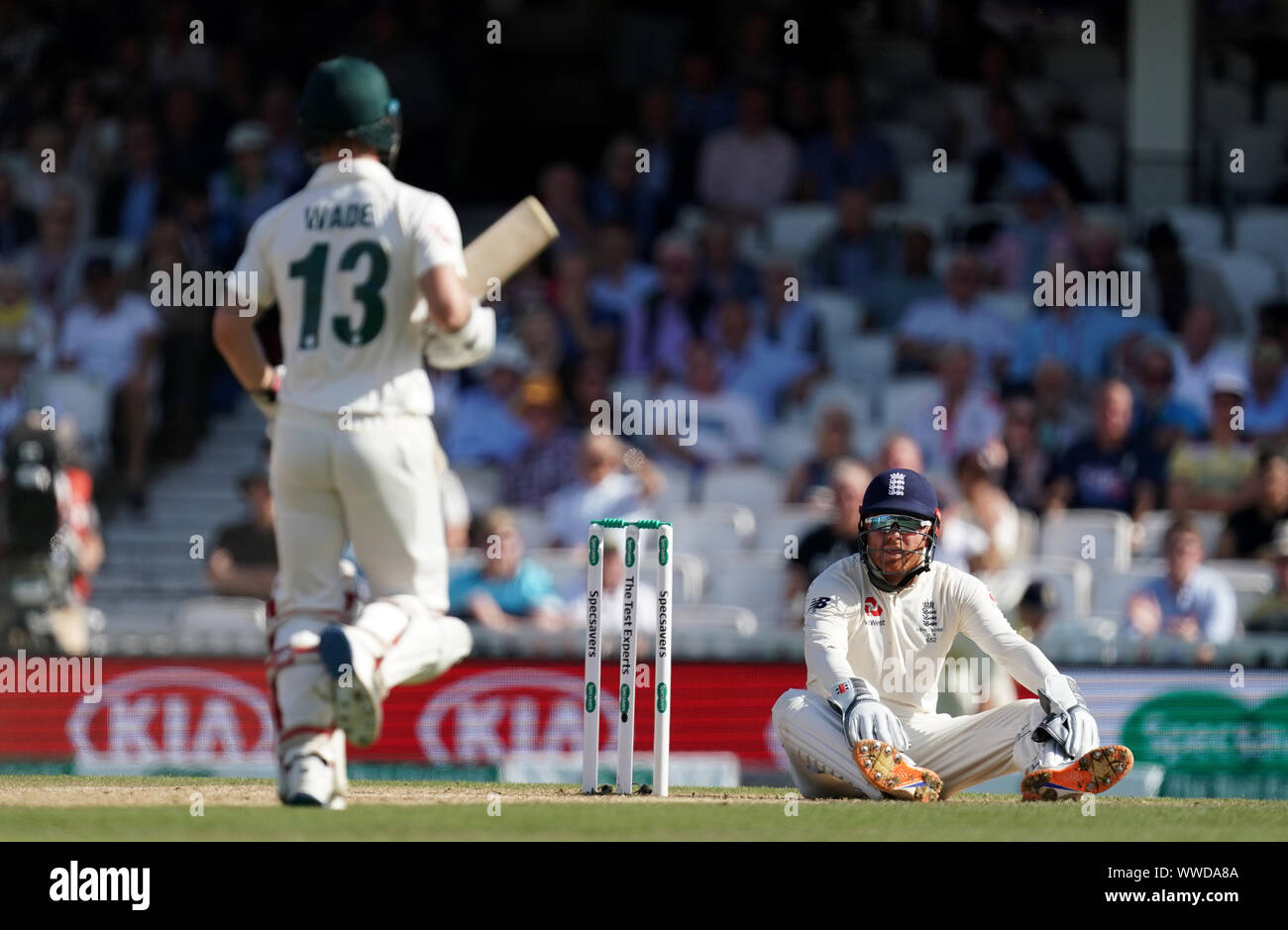 England's Jonny Bairstow (right) reacts during day four of the fifth test match at The Kia Oval, London. Stock Photo