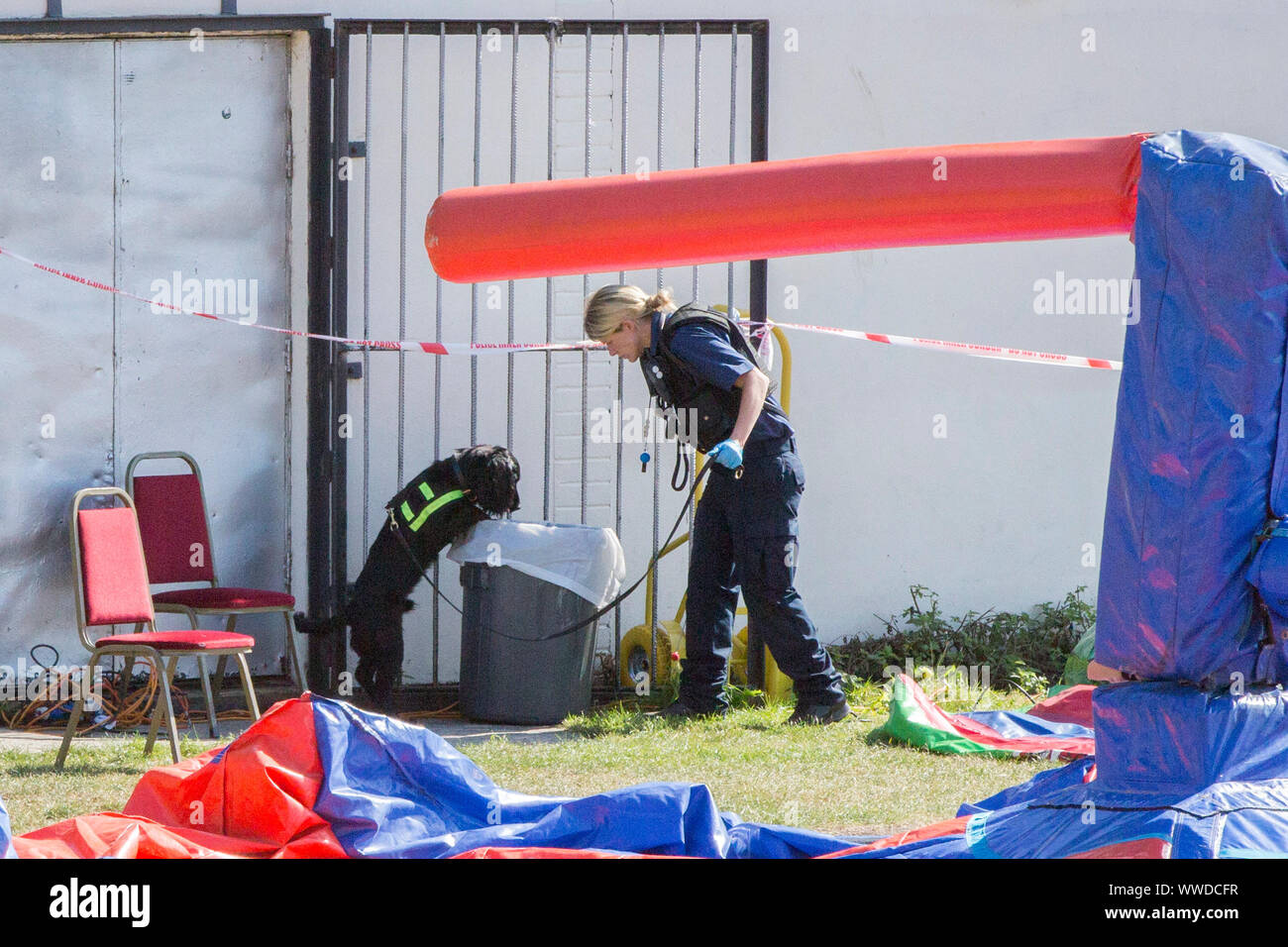 Police search in Jubilee Park, Edmonton, following the fatal stabbing of a 29-year-old man. Birthday party guests attending a party at the near-by Old Edmontonians FC clubhouse, sat on the suspected attacker until police arrived following the attack in north London, a witness has claimed. Stock Photo