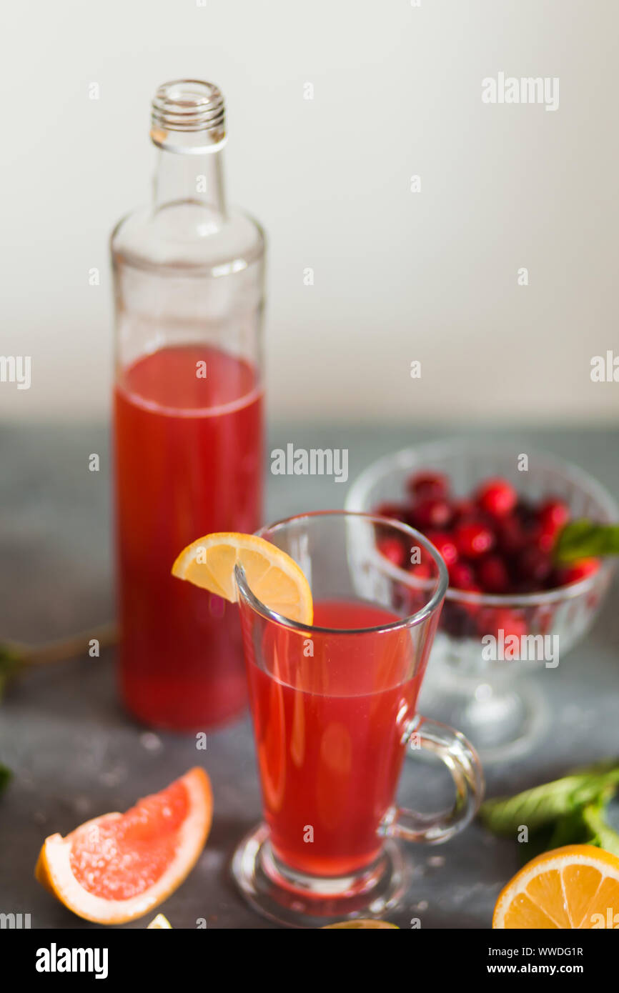 Three mason jar glasses of summer iced tea, lemonade, and pink lemonade drinks isolated on a ...