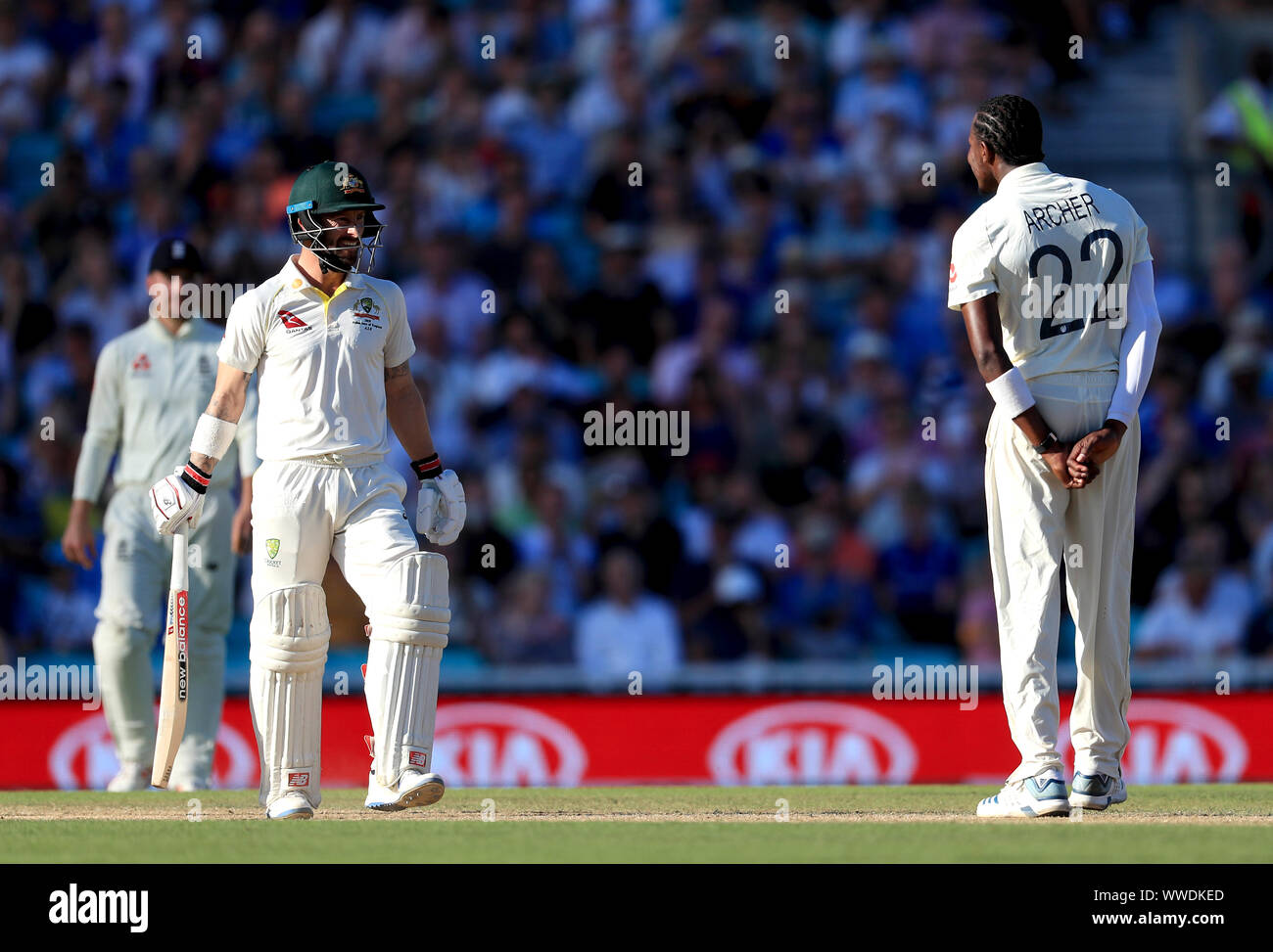 England's Jofra Archer (right) and Australia's Matthew Wade exchange words during day four of the fifth test match at The Kia Oval, London. Stock Photo