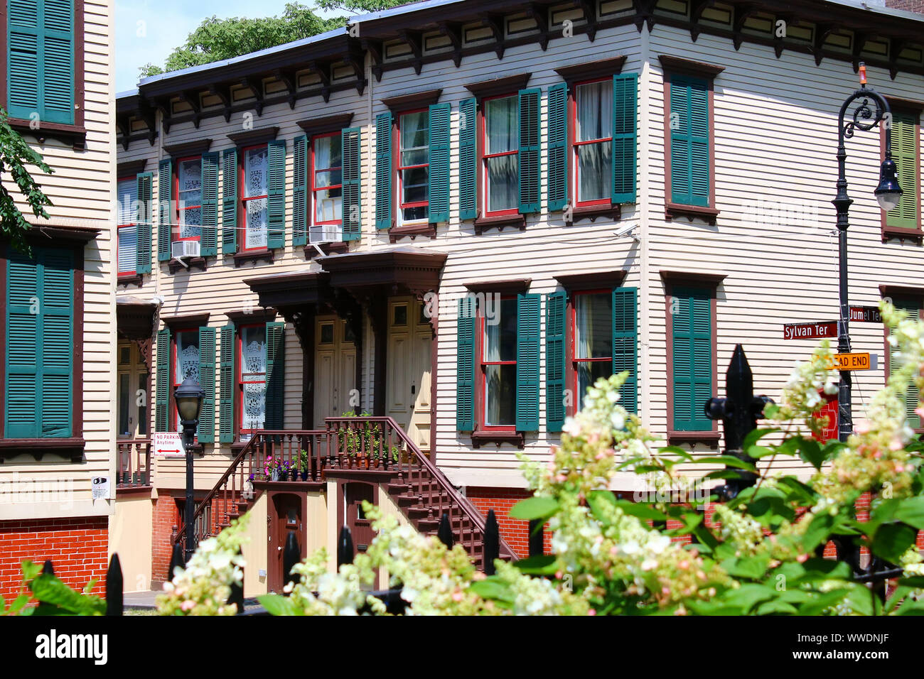 Sylvan Terrace wooden frame houses were built in 1882-1883 and are part of Jumel Terrace Historic District in Washington Heights, Manhattan on August Stock Photo