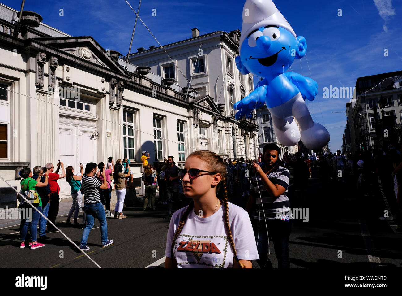 Brussels, Belgium. 15th Sep, 2019. A giant balloon of a Smurf comic strip character floats during the Balloon Day Parade along the downtown boulevards in Brussels, Belgium September 15, 2019. Credit: ALEXANDROS MICHAILIDIS/Alamy Live News Stock Photo
