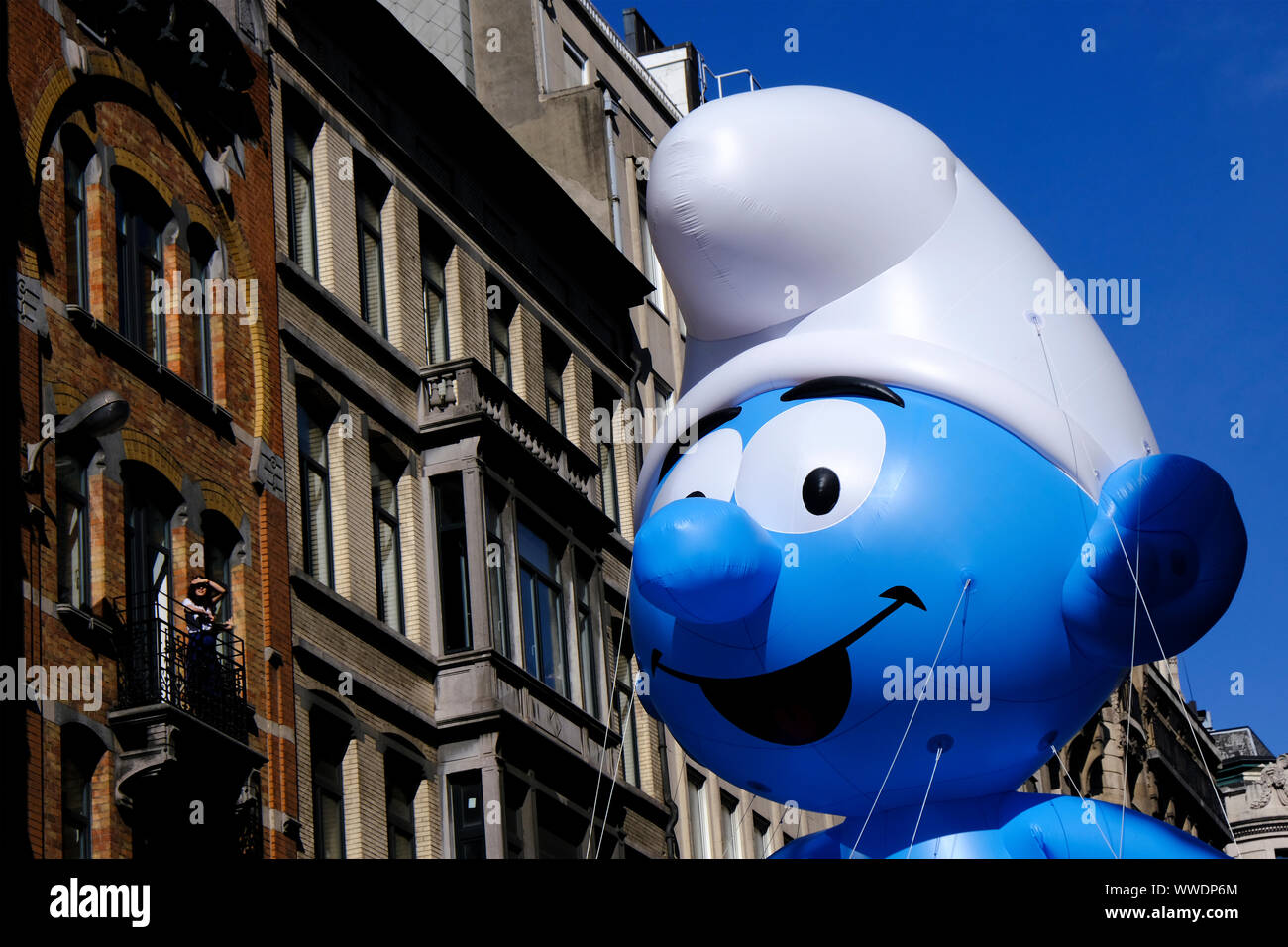 Brussels, Belgium. 15th Sep, 2019. A giant balloon of a Smurf comic strip character floats during the Balloon Day Parade along the downtown boulevards in Brussels, Belgium September 15, 2019. Credit: ALEXANDROS MICHAILIDIS/Alamy Live News Stock Photo
