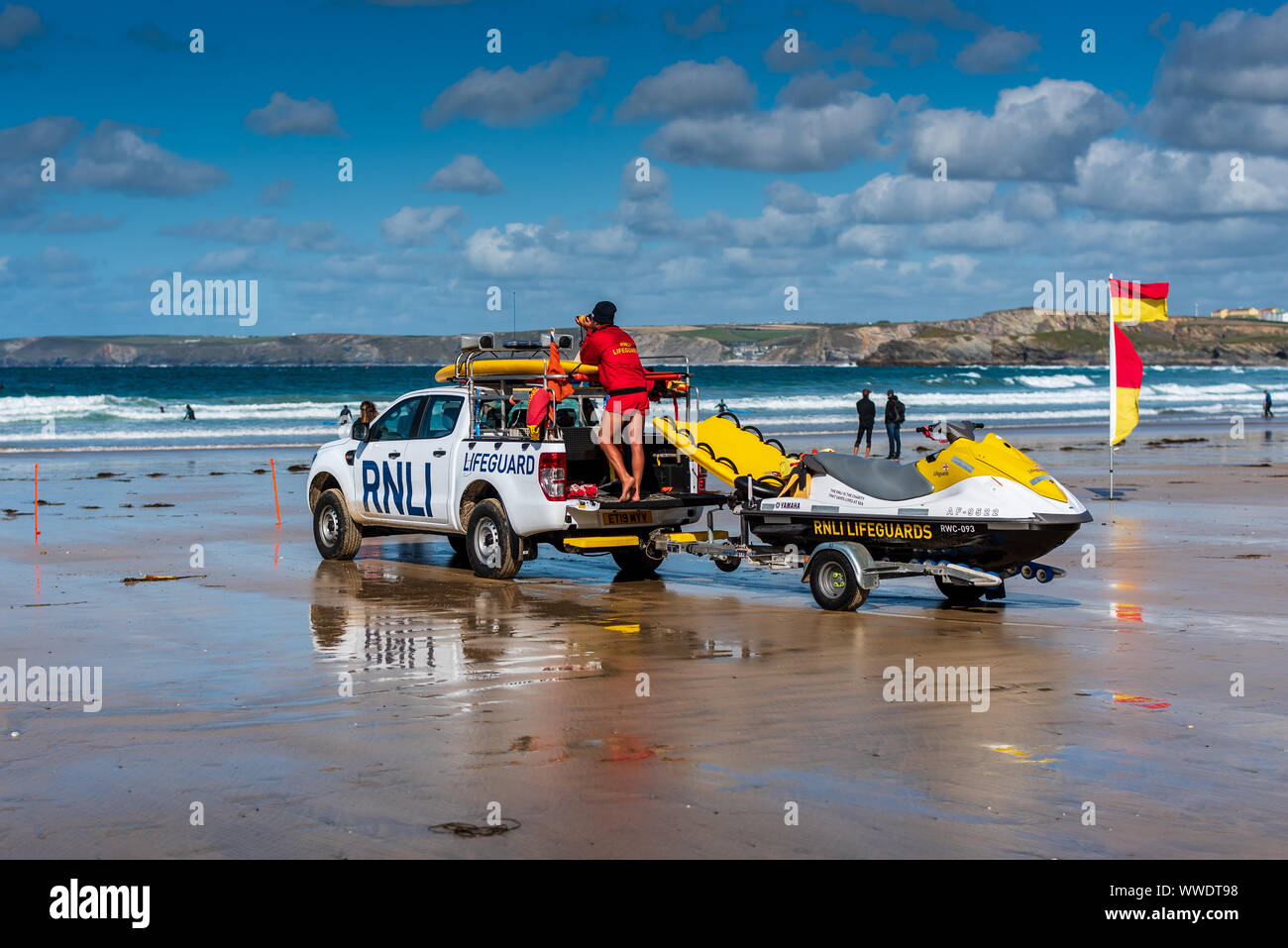 RNLI Lifeguards Cornwall - RNLI Beach Lifeguards on patrol in North Cornwall UK Stock Photo