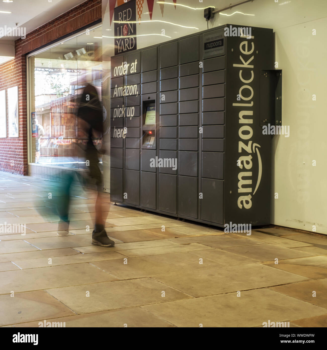 COLCHESTER, ESSEX - AUGUST 11, 2018:  Amazon pick up point Locker in retail setting Stock Photo