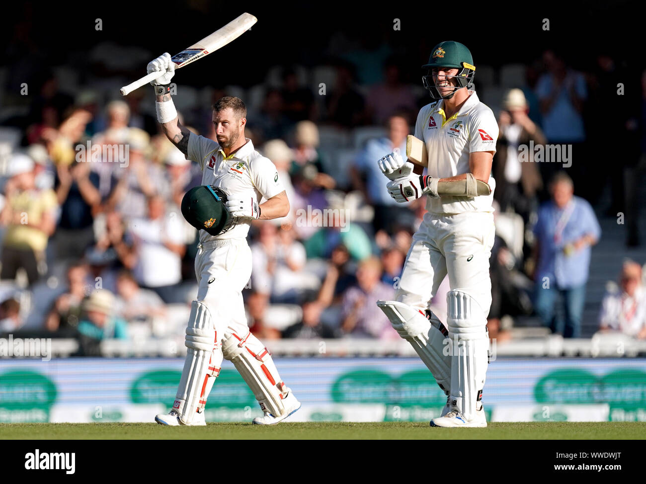 Australia's Matthew Wade (left) during day four of the fifth test match at The Kia Oval, London. Stock Photo