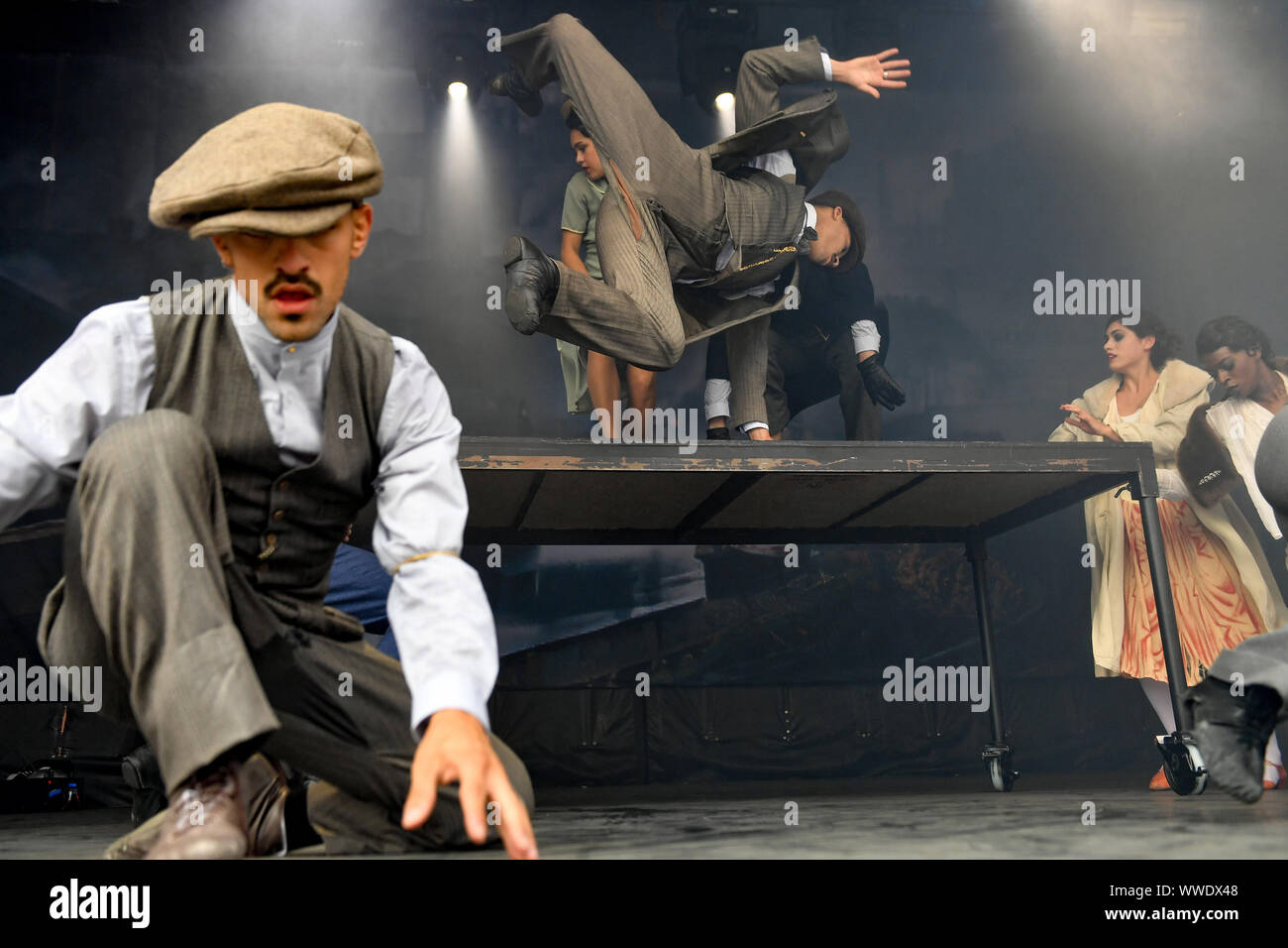 Members from the Rambert Dance Company perform during the Peaky Blinders Festival, in Birmingham. Stock Photo