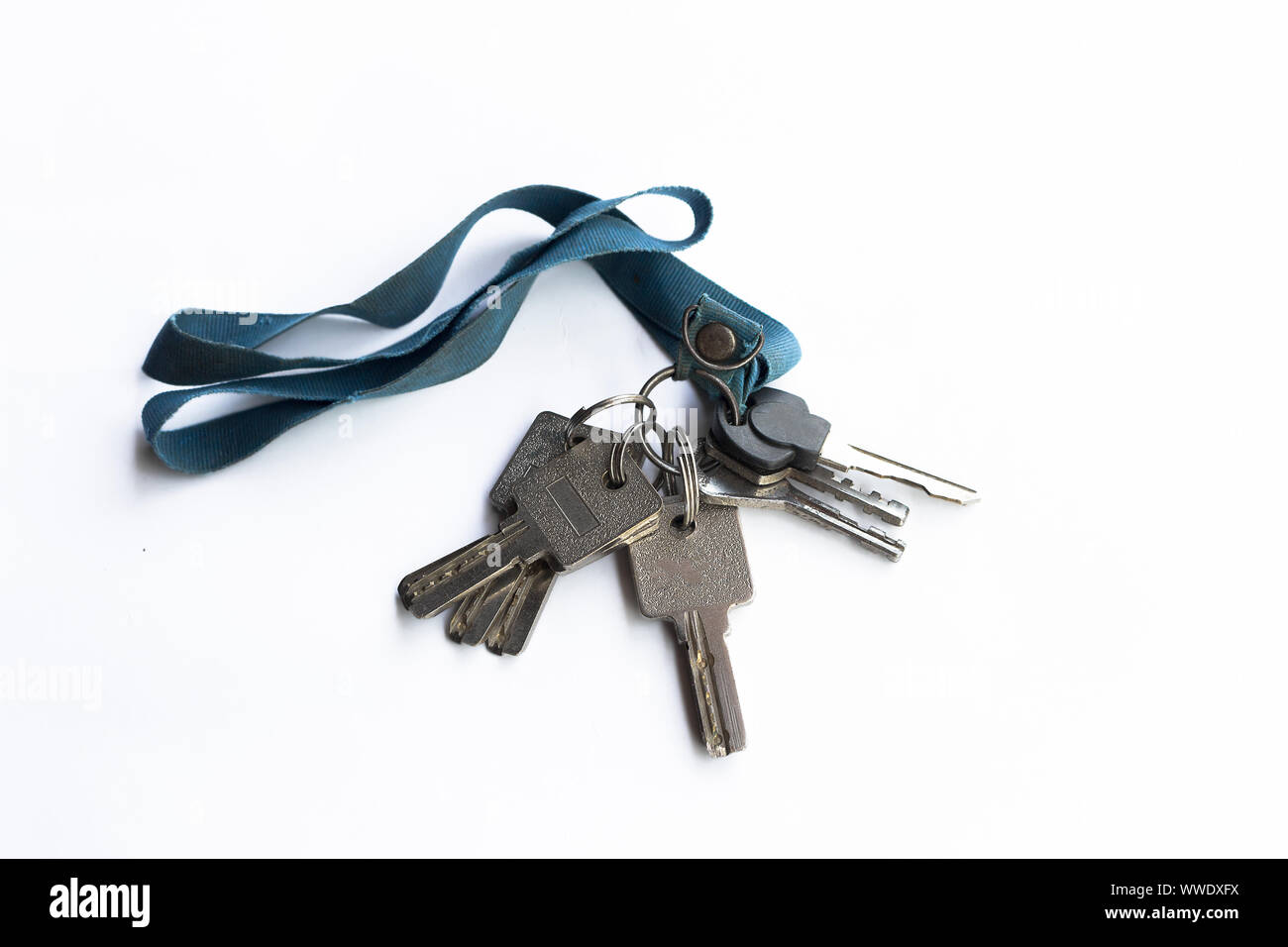Old Bunch of key With neck strap blue color on white background Stock ...