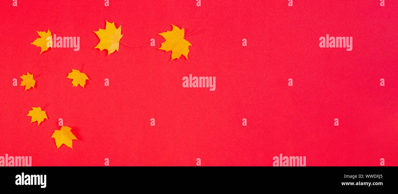 Autumn composition. Frame made of autumn maple leaves on red background Stock Photo - Alamy