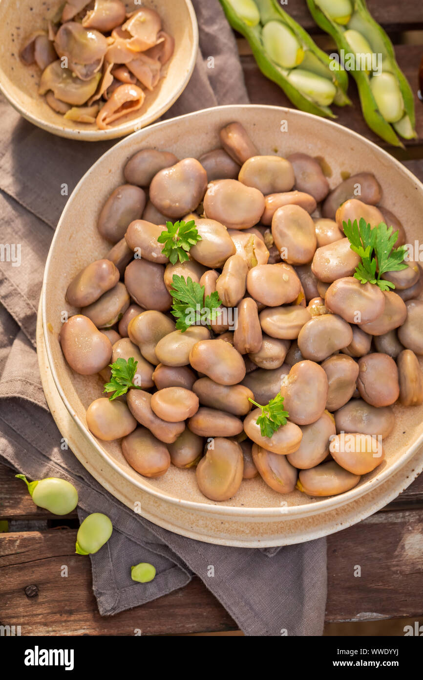 Tasty and homemade broad beans with garlic and parsley Stock Photo Alamy