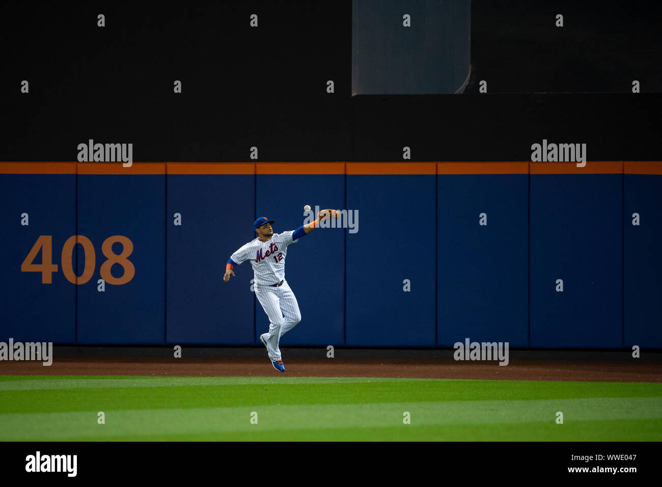 September 13, 2019: New York Mets center fielder Juan Lagares (12) chases down a ball during the game between The New York Mets and The Los Angeles Dodgers at Citi Field in Queens, New York. Mandatory credit: Kostas Lymperopoulos/CSM Stock Photo