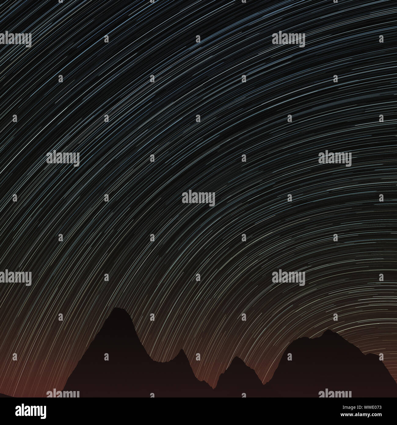 Abstract background with star trails in the night sky and rocks ...