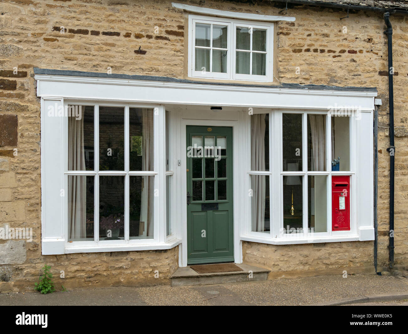 The Old village Post Office shop, now converted to residential use as a home, Easton on the Hill, Northamptonshire, England, UK Stock Photo